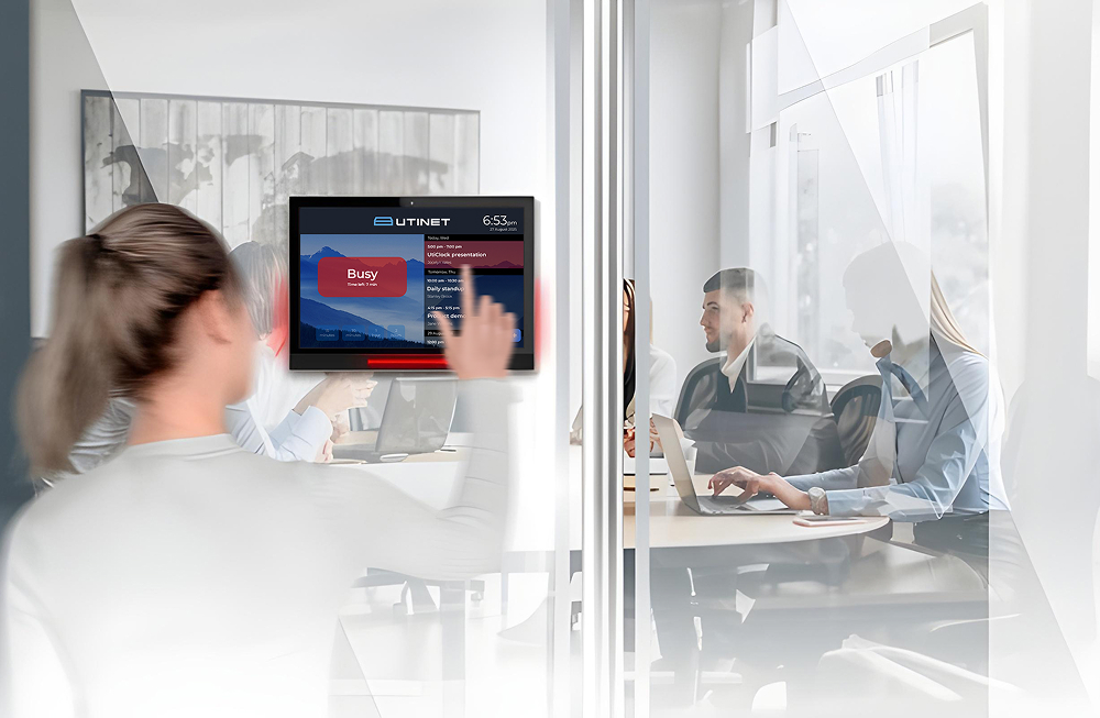 A girl books a meeting room through UtiClock